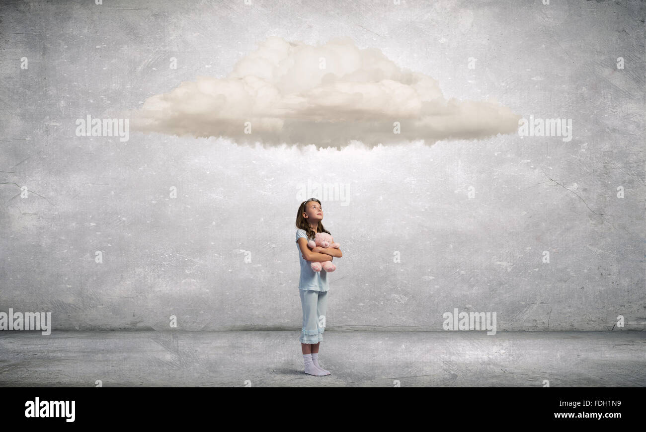 Cute girl wearing pajamas with toy bear in hand Stock Photo - Alamy