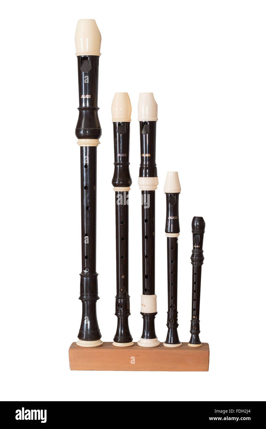 A group of Aulos recorders, Tenor, two Trebles (or Altos), a Descant (or Soprano) and a Sopranino isolated on a white background Stock Photo
