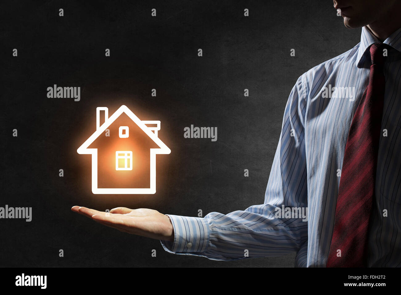 Hand of businessman showing house sign in palm Stock Photo - Alamy