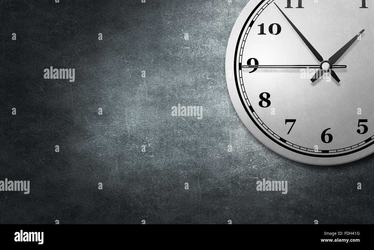 Round wall clock hanging on grey concrete wall Stock Photo - Alamy