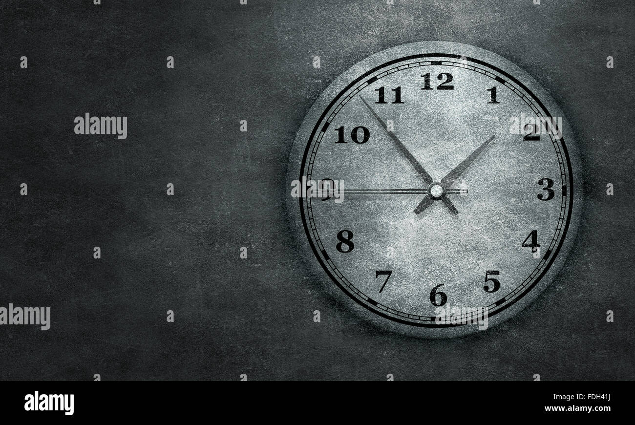 Round wall clock hanging on grey concrete wall Stock Photo - Alamy