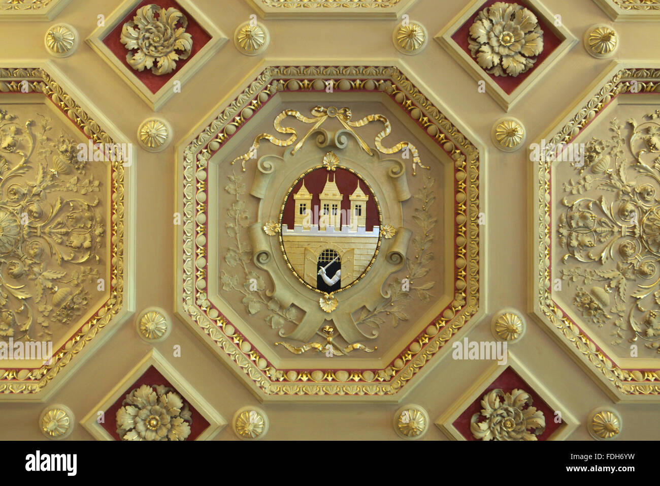 Coat of arms of Prague depicted on the stucco ceiling in the Zofin Palace on Slovansky Island in Prague, Czech Republic. Stock Photo