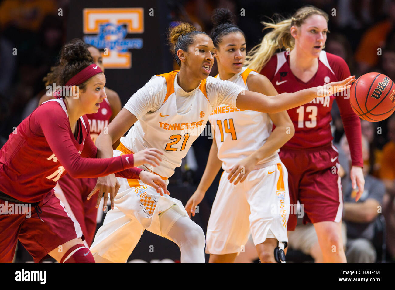 January 31, 2016: Hannah Cook #11 of the Alabama Crimson Tide and Mercedes Russell #21 of the Tennessee Lady Volunteers reach for a loose ball during the NCAA basketball game between the University of Tennessee Lady Volunteers and the University of Alabama Crimson Tide at Thompson Boling Arena in Knoxville TN Tim Gangloff/CSM Stock Photo
