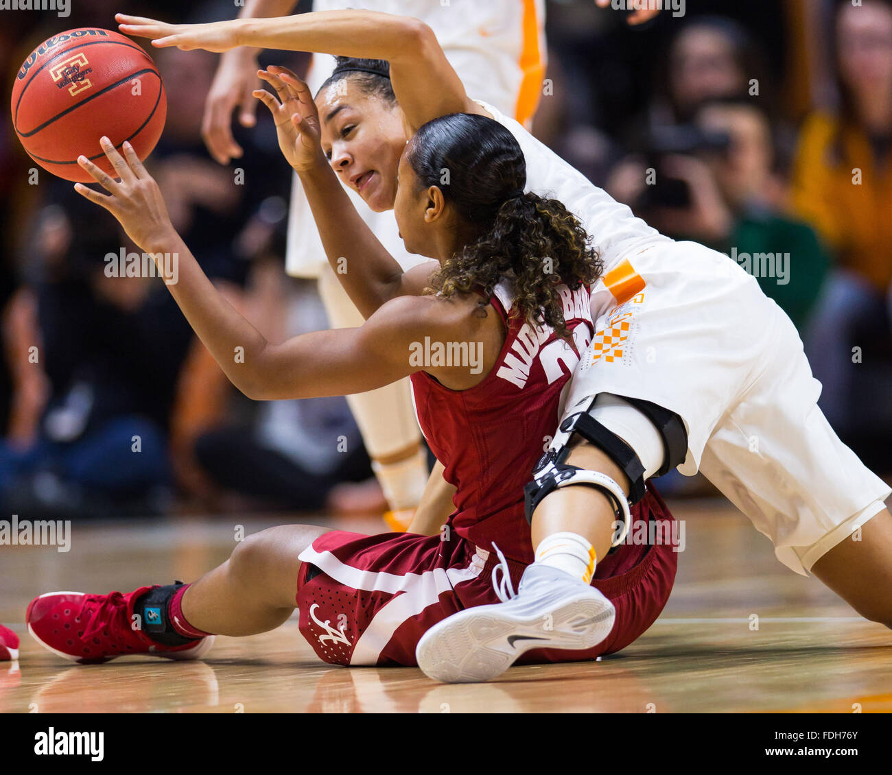 January 31, 2016: Andraya Carter #14 of the Tennessee Lady Volunteers and Karyla Middlebrook #22 of the Alabama Crimson Tide battle for a loose ball during the NCAA basketball game between the University of Tennessee Lady Volunteers and the University of Alabama Crimson Tide at Thompson Boling Arena in Knoxville TN Tim Gangloff/CSM Stock Photo