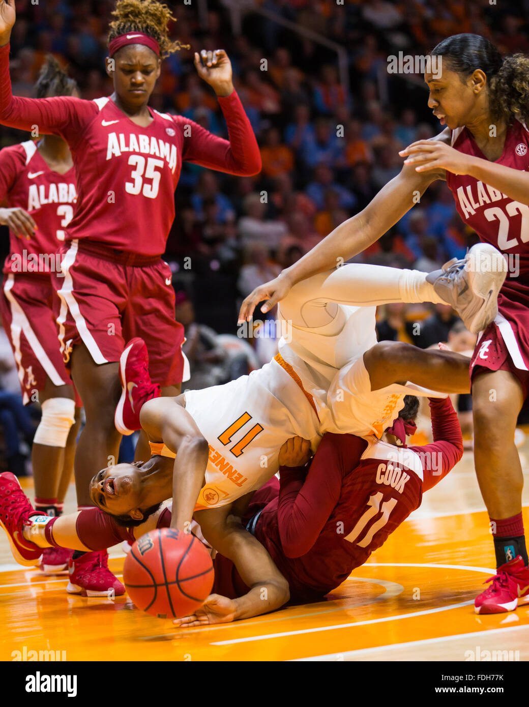 January 31, 2016: Diamond DeShields #11 of the Tennessee Lady Volunteers tumbles over Hannah Cook #11 of the Alabama Crimson Tide while going for a rebound during the NCAA basketball game between the University of Tennessee Lady Volunteers and the University of Alabama Crimson Tide at Thompson Boling Arena in Knoxville TN Tim Gangloff/CSM Stock Photo
