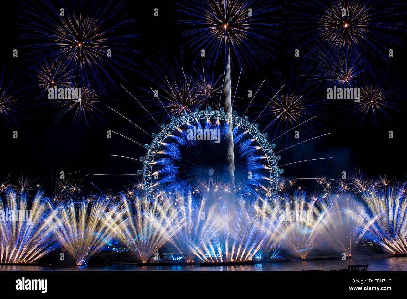 London's New Year 2016 fireworks display at the London Eye. Taken from the RAF statue on the North bank of the River Thames.  Featuring: View Where: London, United Kingdom When: 31 Dec 2015 Stock Photo