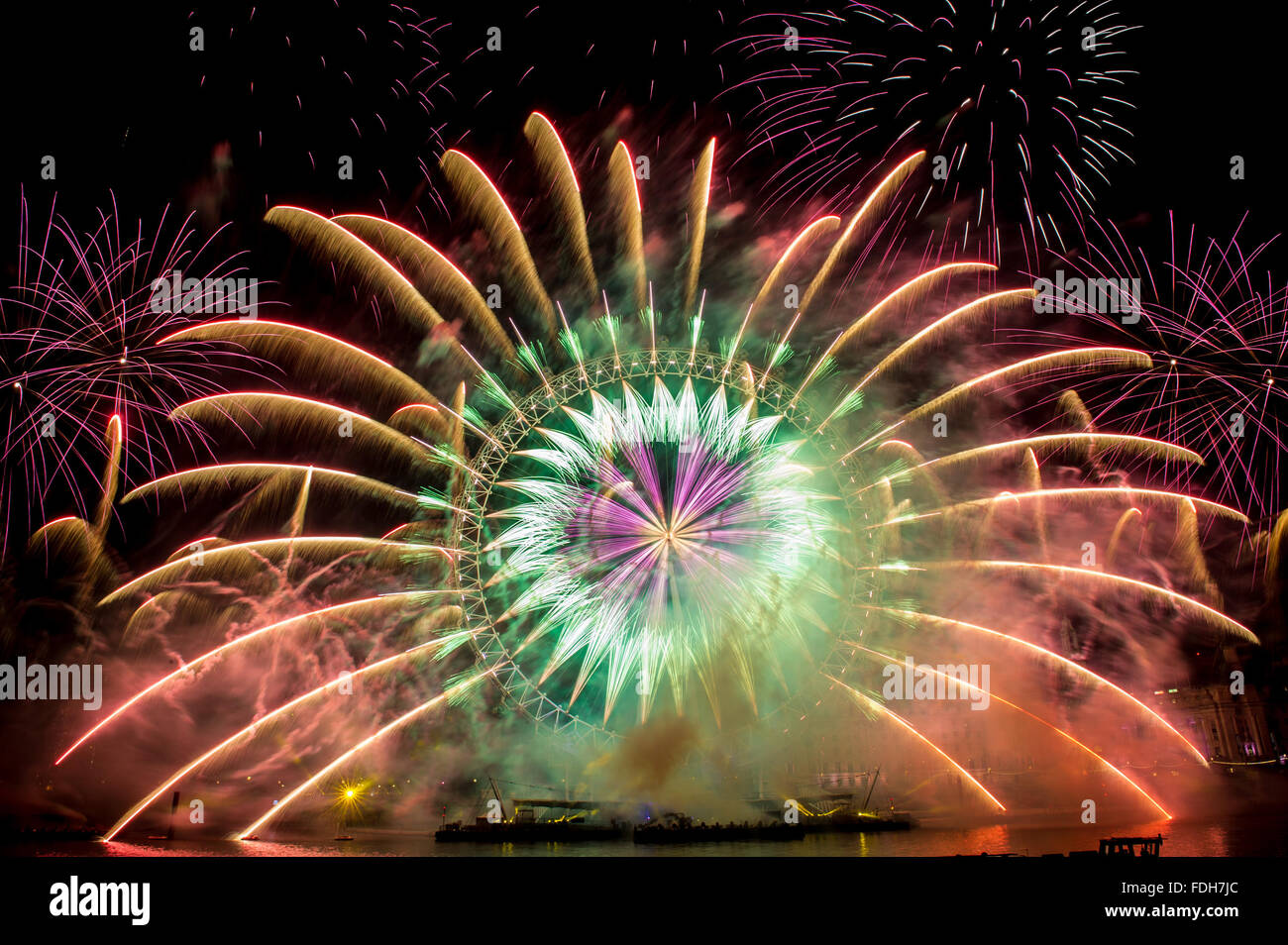 London's New Year 2016 fireworks display at the London Eye. Taken from the RAF statue on the North bank of the River Thames.  Featuring: View Where: London, United Kingdom When: 31 Dec 2015 Stock Photo