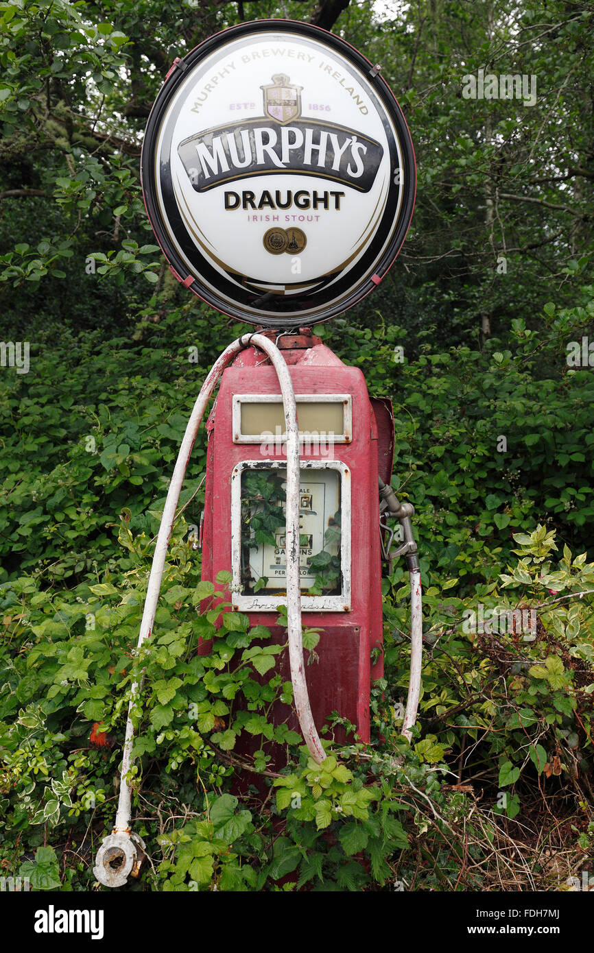 Murphy's Stout logo on an old disused petrol pump near Laragh village on Beara Peninsula, County Kerry, Ireland Stock Photo