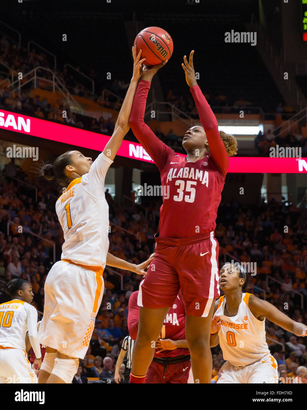 January 31, 2016: Nia Moore #1 of the Tennessee Lady Volunteers blocks the shot of Diamante Martinez #35 of the Alabama Crimson Tide during the NCAA basketball game between the University of Tennessee Lady Volunteers and the University of Alabama Crimson Tide at Thompson Boling Arena in Knoxville TN Tim Gangloff/CSM Stock Photo