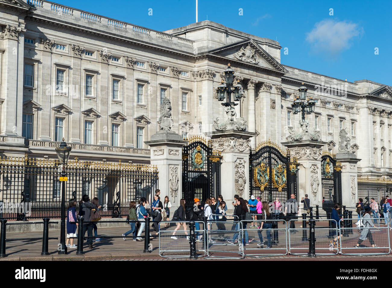 Tourists outside of Buckingham Palace in London, England. Stock Photo