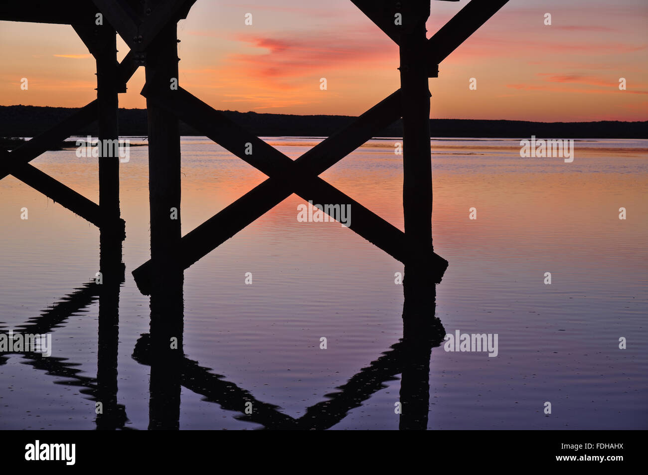Wooden bridge of Quinta do Lago during twilight. Algarve, Portugal