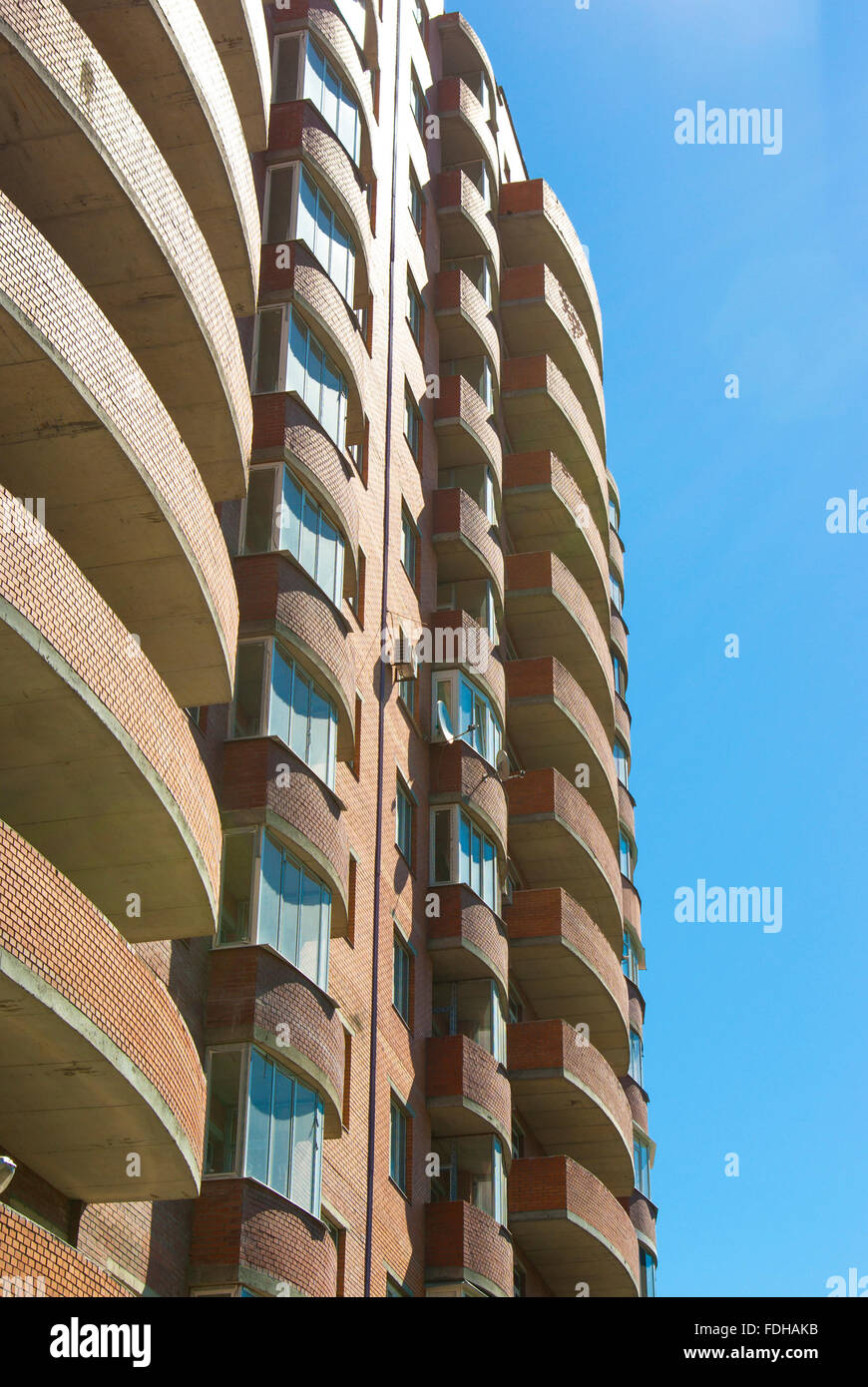 high residential house on blue sky background with trees Stock Photo ...