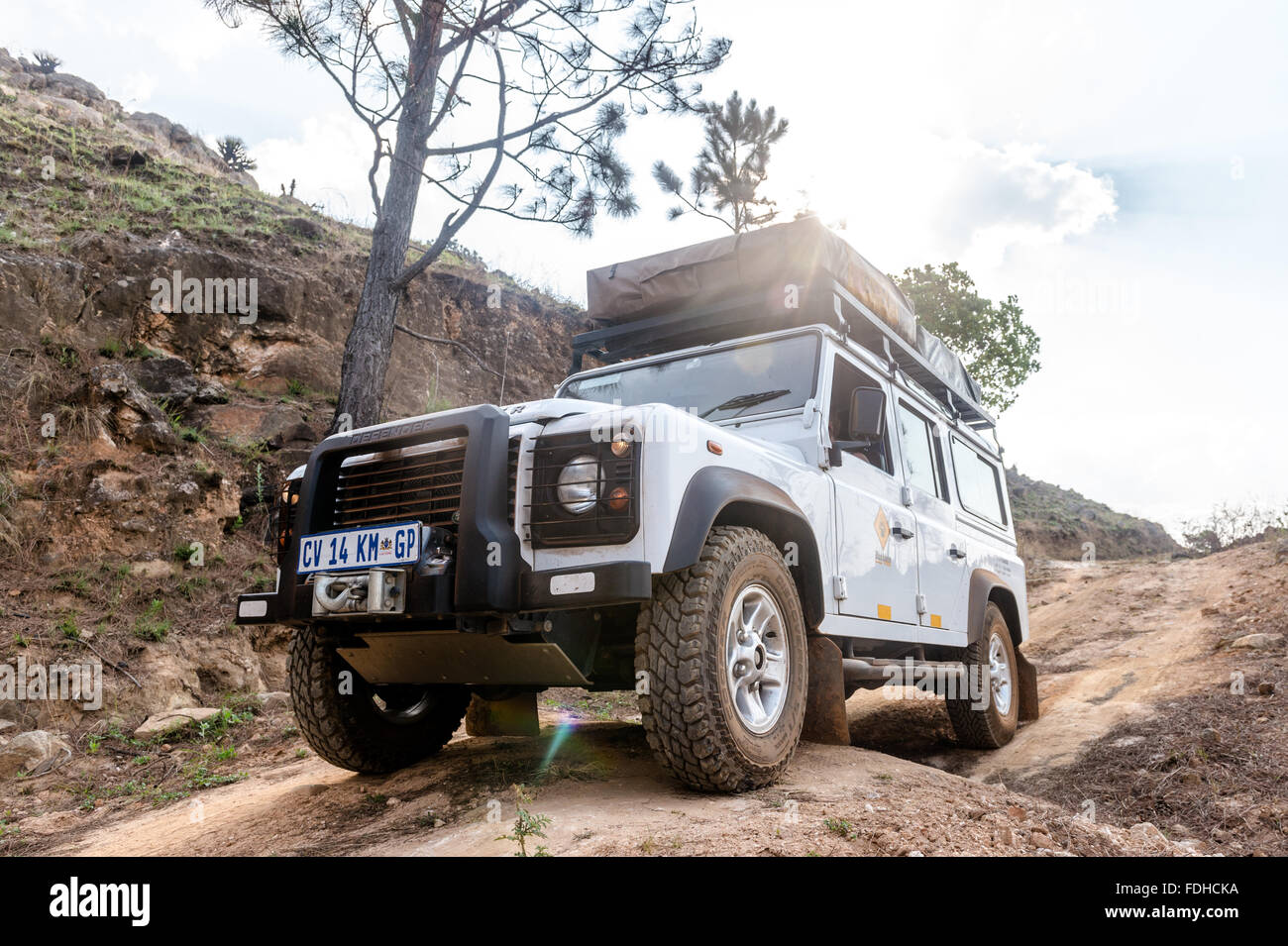 Landrover Defender parked on a dirt road in Mlilwane Wildlife Sanctuary in Swaziland, Africa. Stock Photo