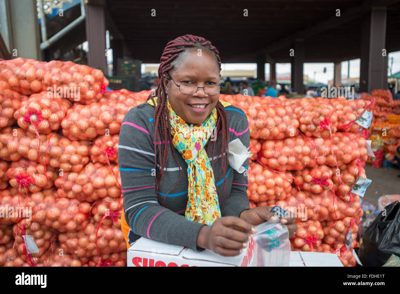 Portrait of a woman selling produce at the Manzini Wholesale Produce and Craft Market in Swaziland, Africa. Stock Photo