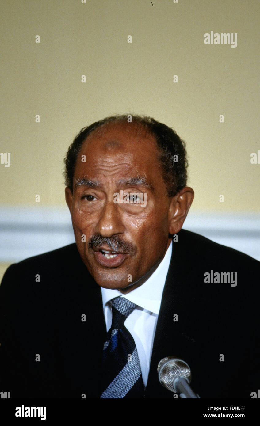 Washington, DC., USA, 6th August, 1981 Anwar Sadat President of Egypt talks with reporters in the Blair House dining room during his official state visit to the White House. Muhammad Anwar El Sadat  was the third President of Egypt, serving from 15 October 1970 until his assassination by fundamentalist army officers on 6 October 1981. Sadat was a senior member of the Free Officers who overthrew King Farouk in the Egyptian Revolution of 1952, and a close confidant of President Gamal Abdel Nasser, whom he succeeded as President in 1970. Credit: Mark Reinstein Stock Photo