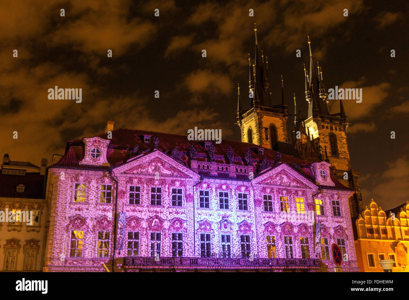 Prague Palace seat of National Gallery, The Rococo style Prague Kinsky Palace illuminated during Prague Festival of Light, Old Town Square, Tyn Church Stock Photo
