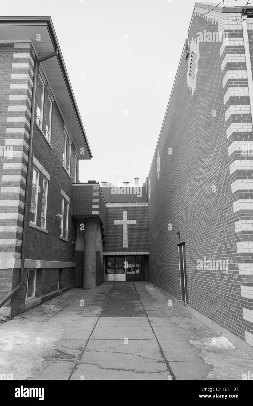 old brick school entrance, Catholic school over 100 years old Stock Photo
