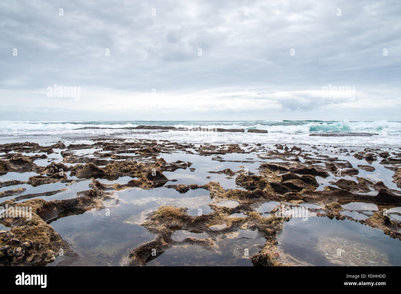 Rocky beach in Saint Lucia, Kwazulu-Natal, South Africa - iSimangaliso Wetland Park Stock Photo