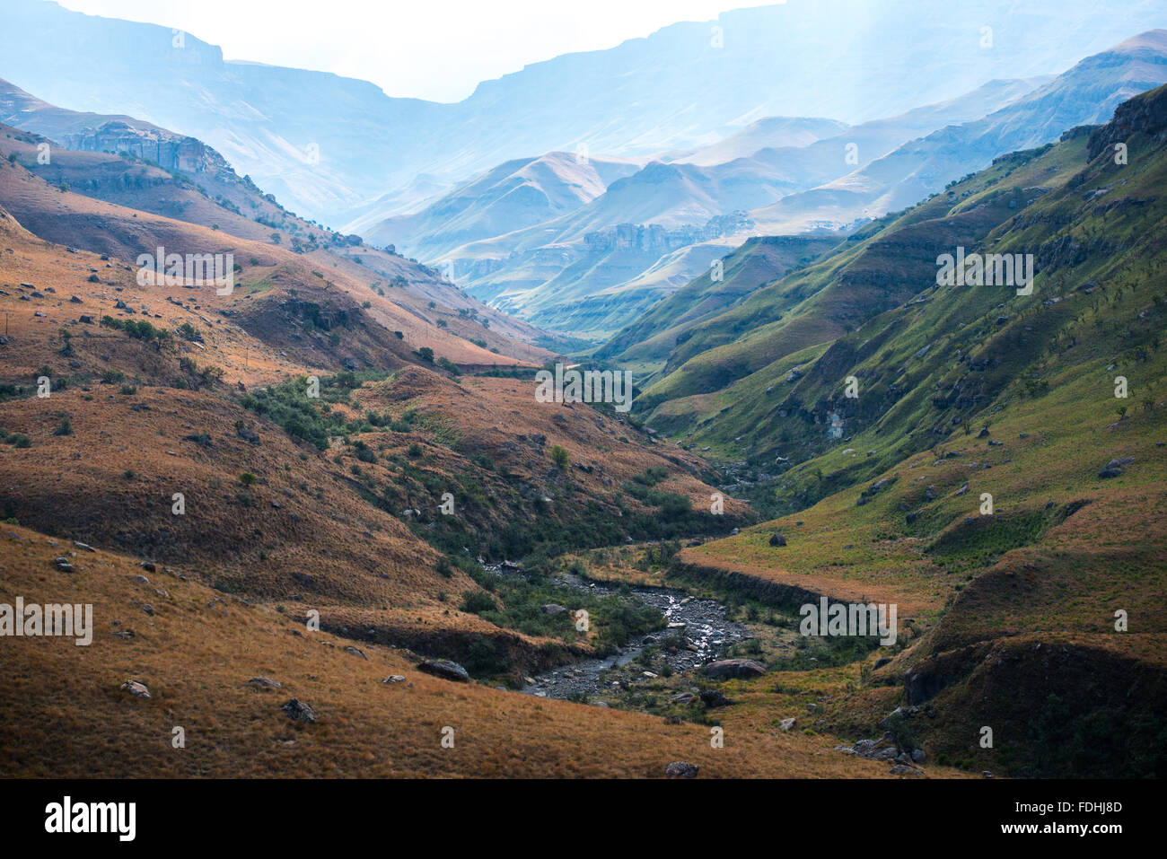 Landscape of mountain with a river winding through the valley in Sani Pass, between South Africa and Lesotho. Stock Photo