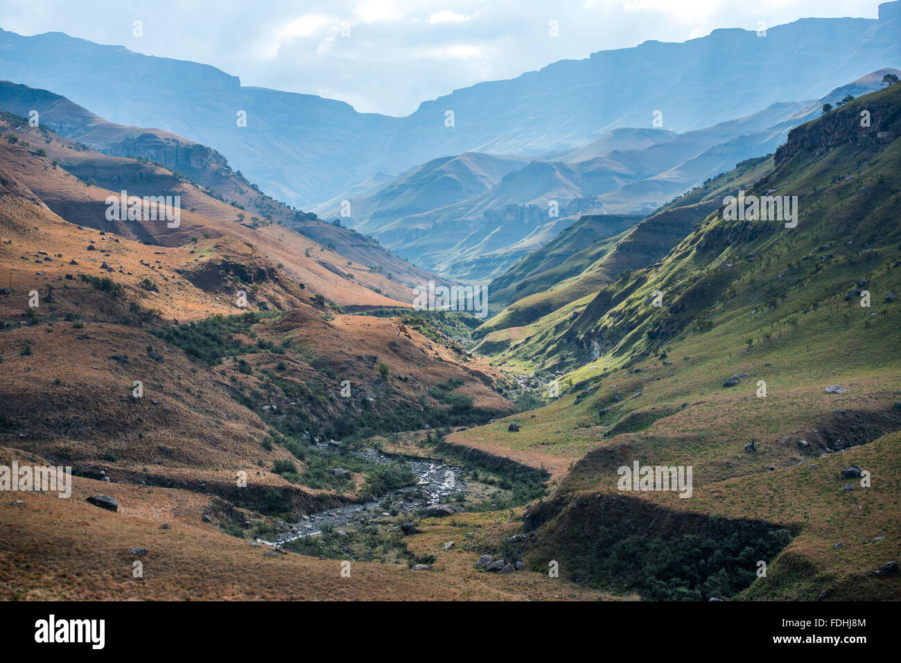 Landscape of mountain with a river winding through the valley in Sani Pass, between South Africa and Lesotho. Stock Photo