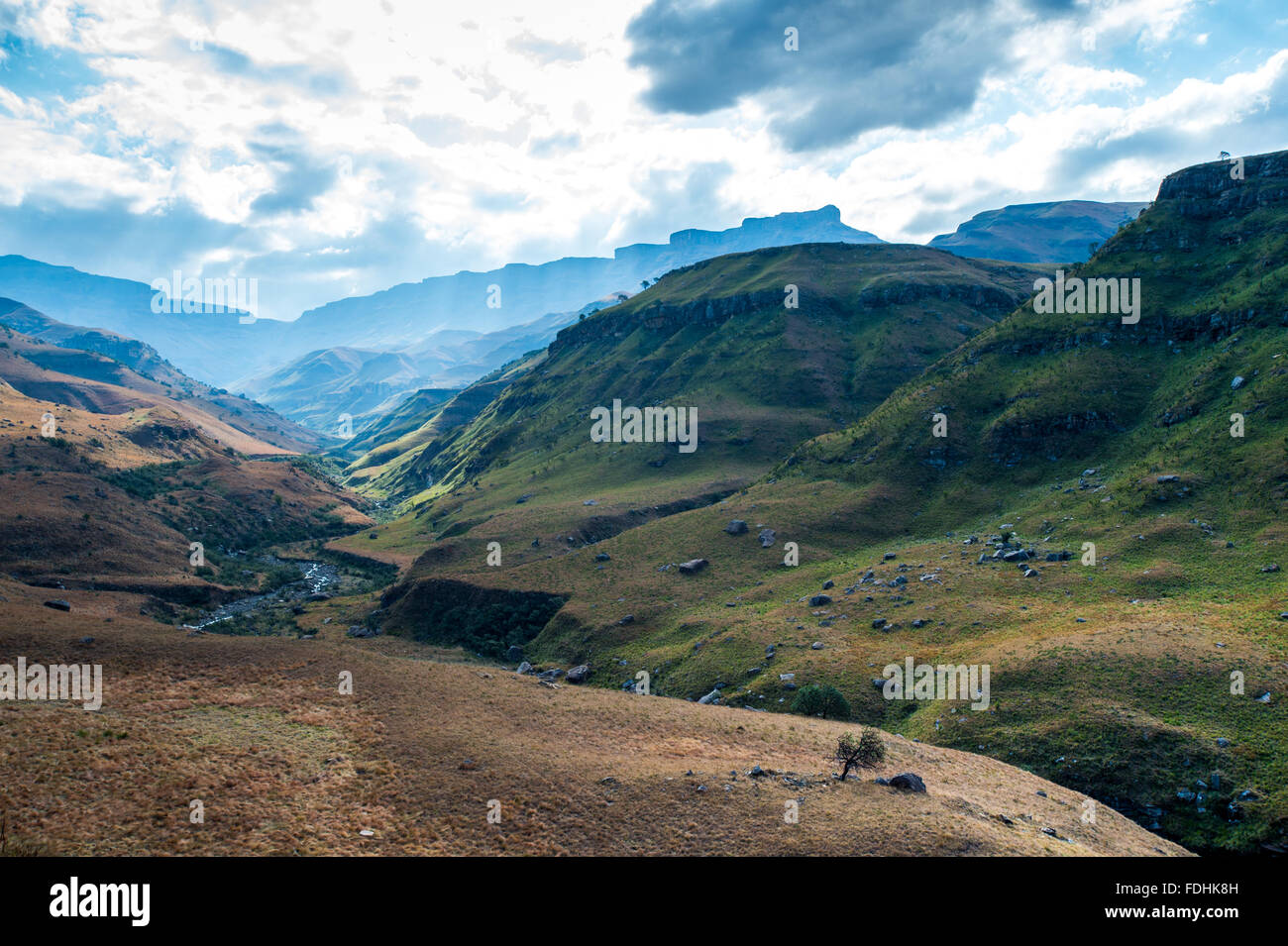 Landscape of mountain with a river winding through the valley in Sani Pass, between South Africa and Lesotho. Stock Photo