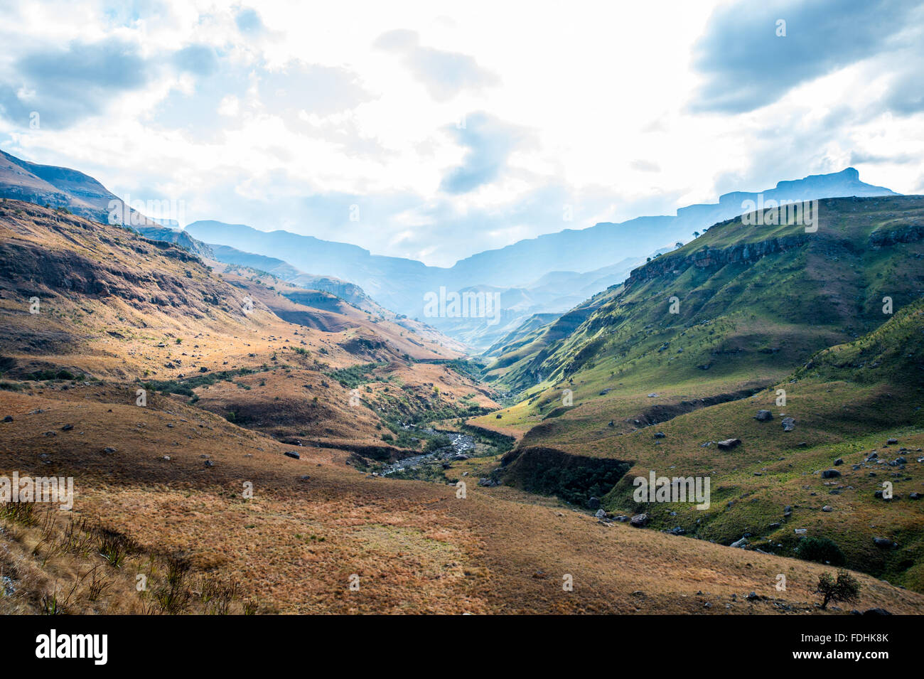 Landscape of mountain with a river winding through the valley in Sani Pass, between South Africa and Lesotho. Stock Photo