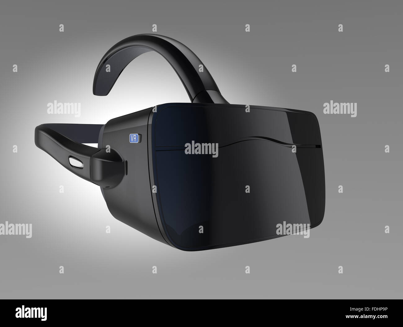 Black VR headset isolated on gray background. Stock Photo
