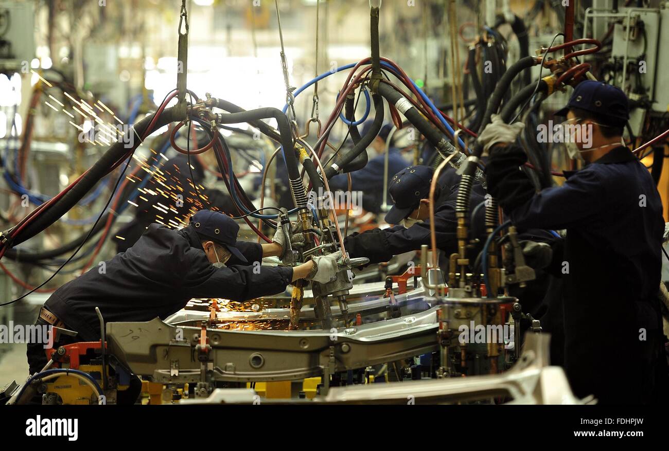 Shijiazhuang, December. 1st Feb, 2016. Workers are occupied on a production line at a