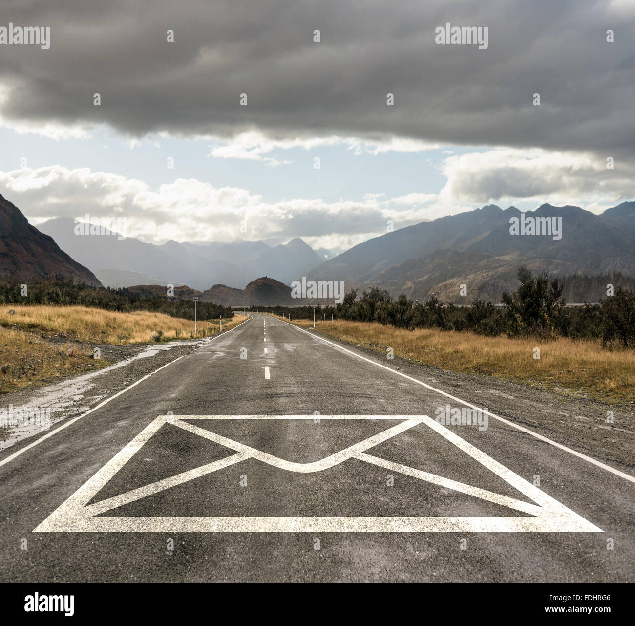 Natural landscape of asphalt road and drawn mail sign on it Stock Photo ...