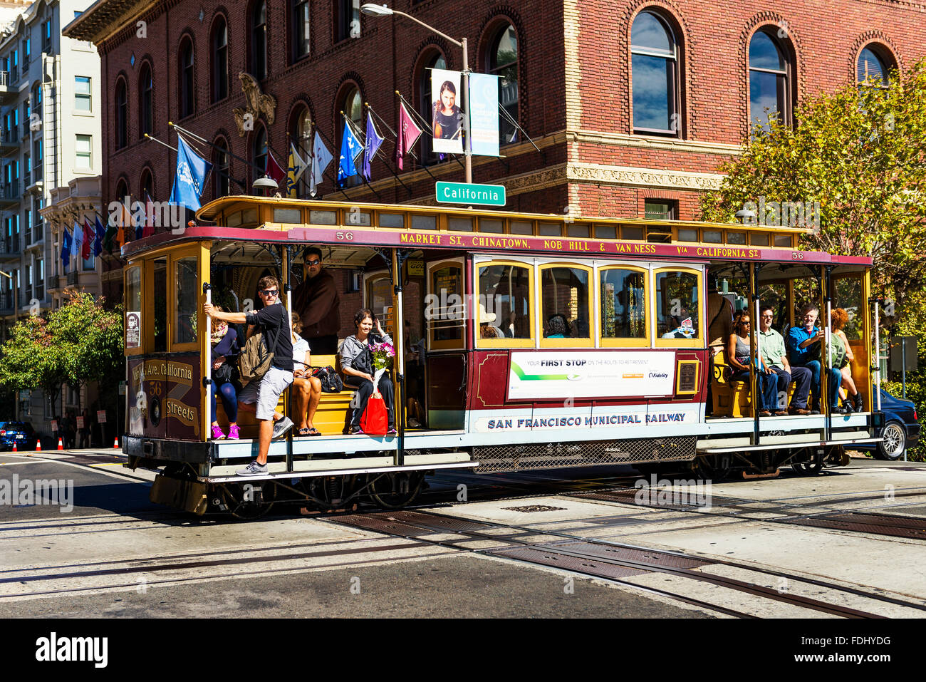 SAN FRANCISCO - OCT 06: Passengers enjoy a ride in a cable car on Oct ...