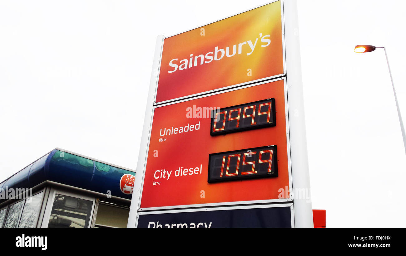 Supermarket giant, Sainsburys selling unleaded petrol for less than £1 per litre. Stock Photo