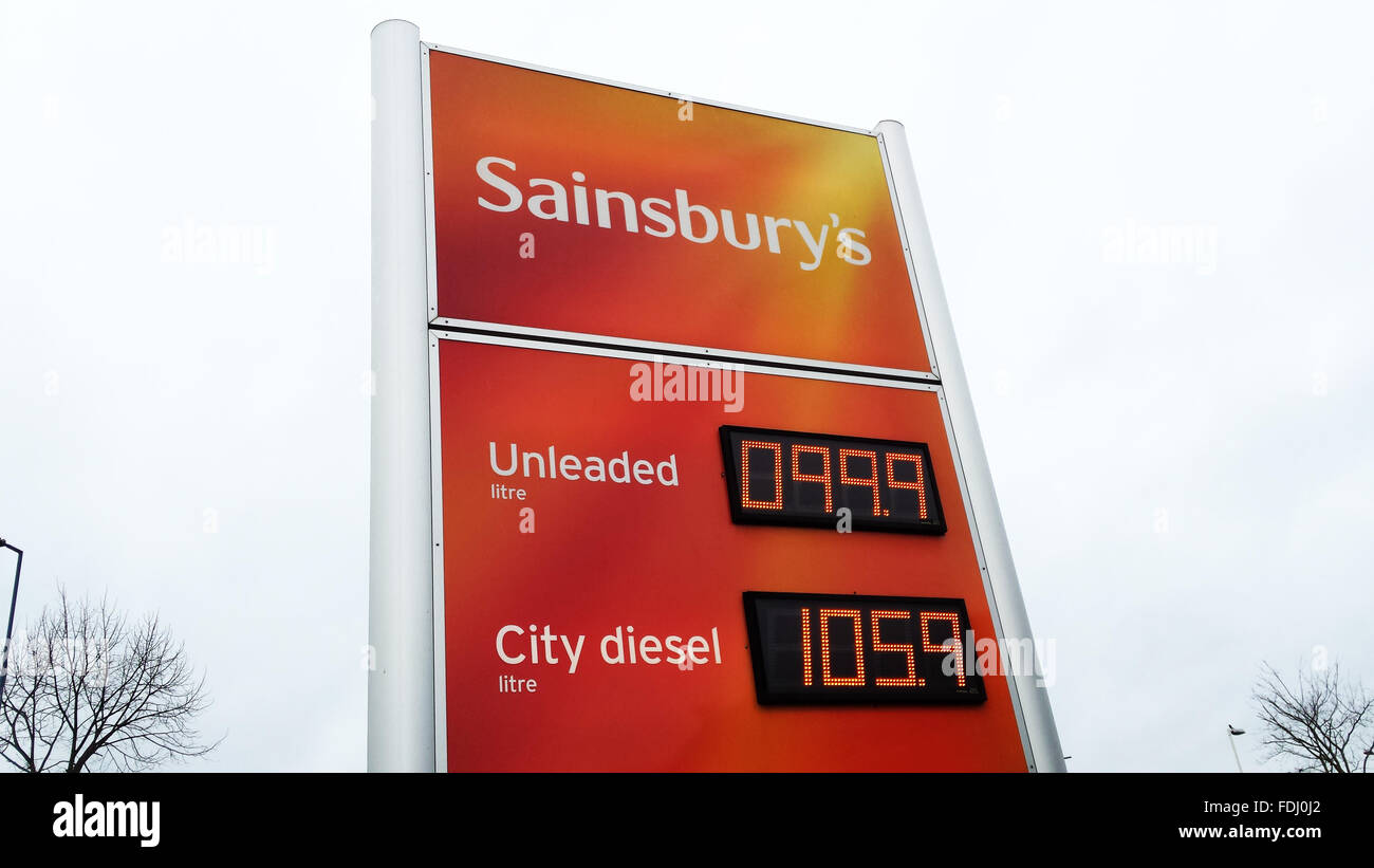 Supermarket giant, Sainsburys selling unleaded petrol for less than £1 per litre. Stock Photo