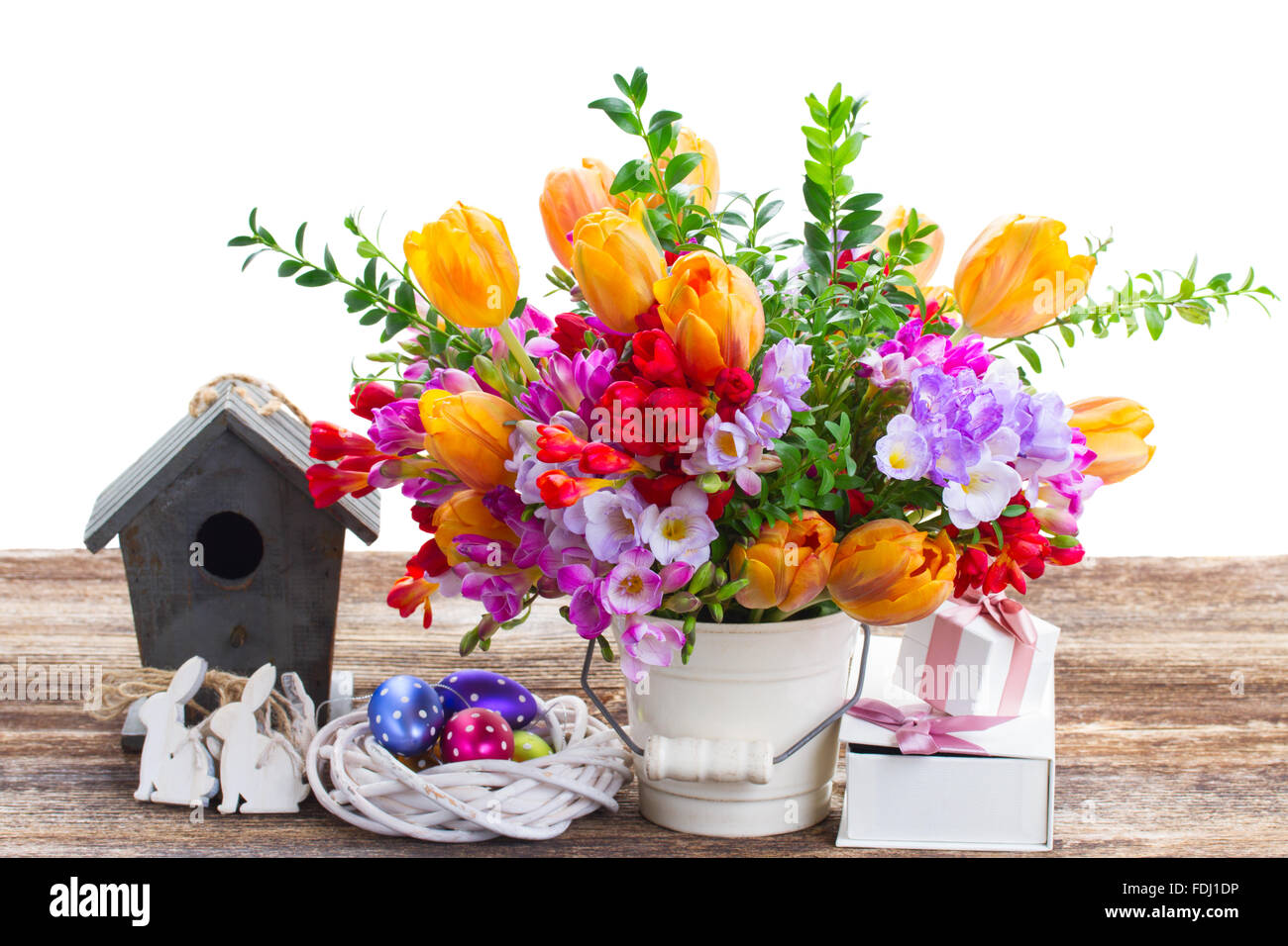 Spring flowers with easter eggs Stock Photo - Alamy