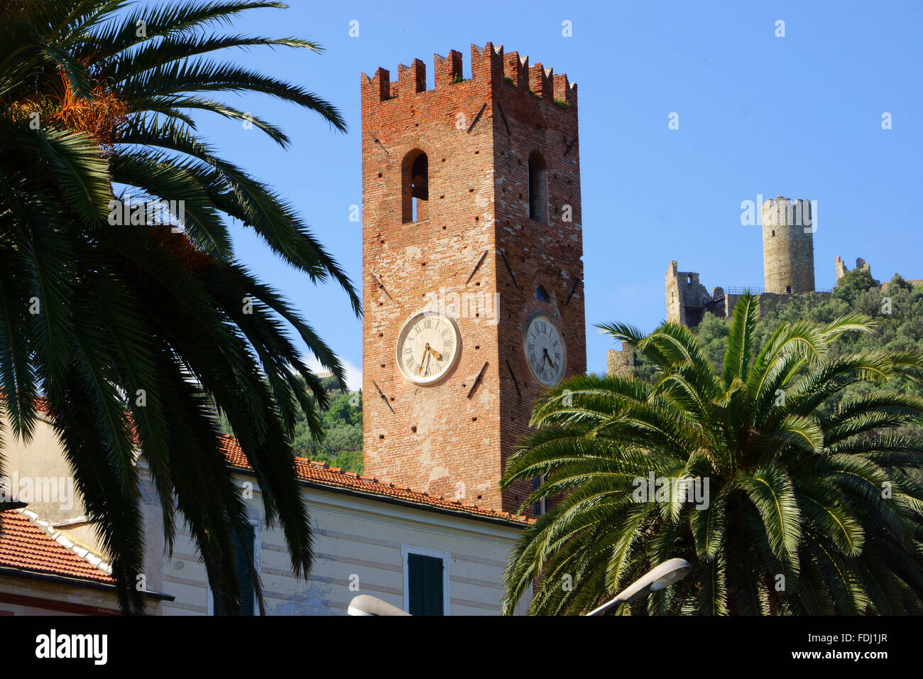 Medieval town Noli with Family tower and  ruin of Castle, Liguria, Gulf of Ponente, Italy Stock Photo
