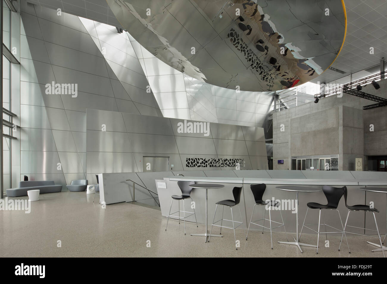 Multi Purpose Area At The Top Of Spiral Staircase With Reflection