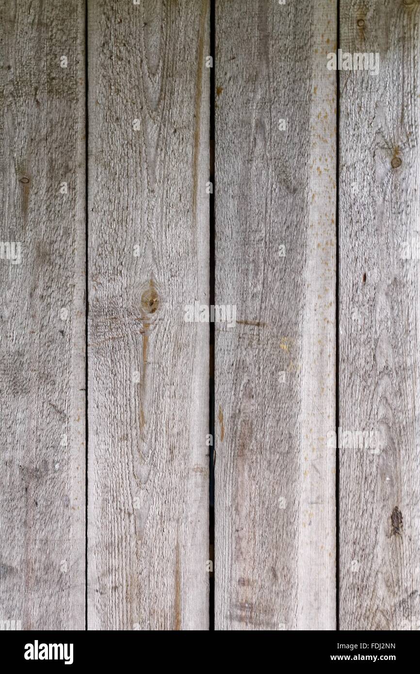 Rustic background of old wooden plank wall. Grungy and textured surface of beautiful aged wood. Stock Photo