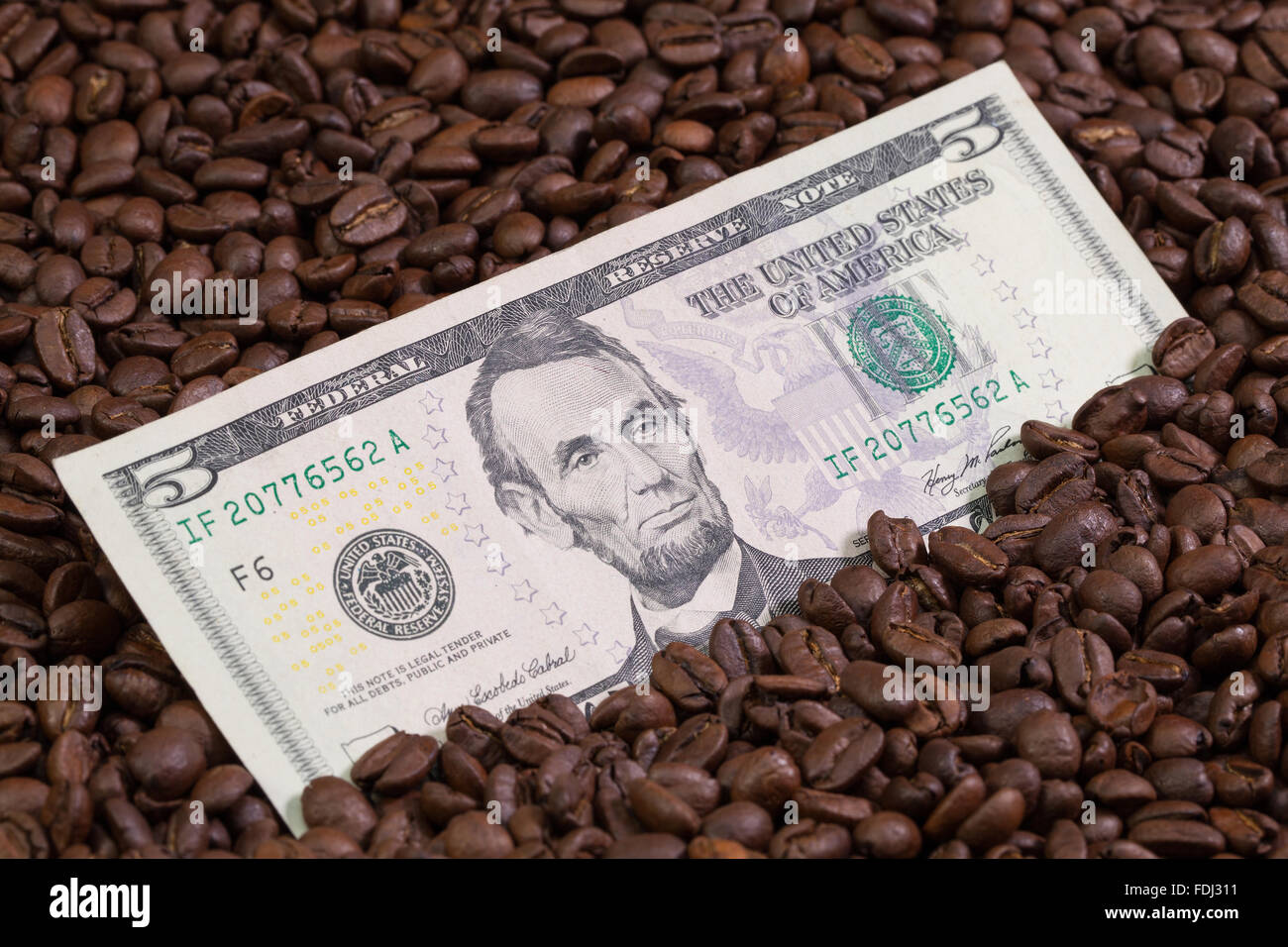 Coffee beans and US dollar banknote Stock Photo Alamy