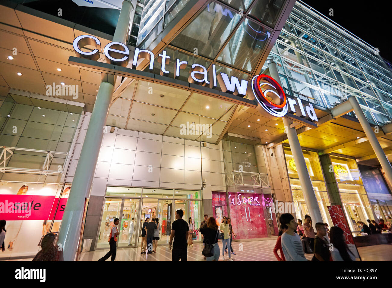 Entrance of the CentralWorld Shopping Plaza illuminated at night. Bangkok, Thailand. Stock Photo