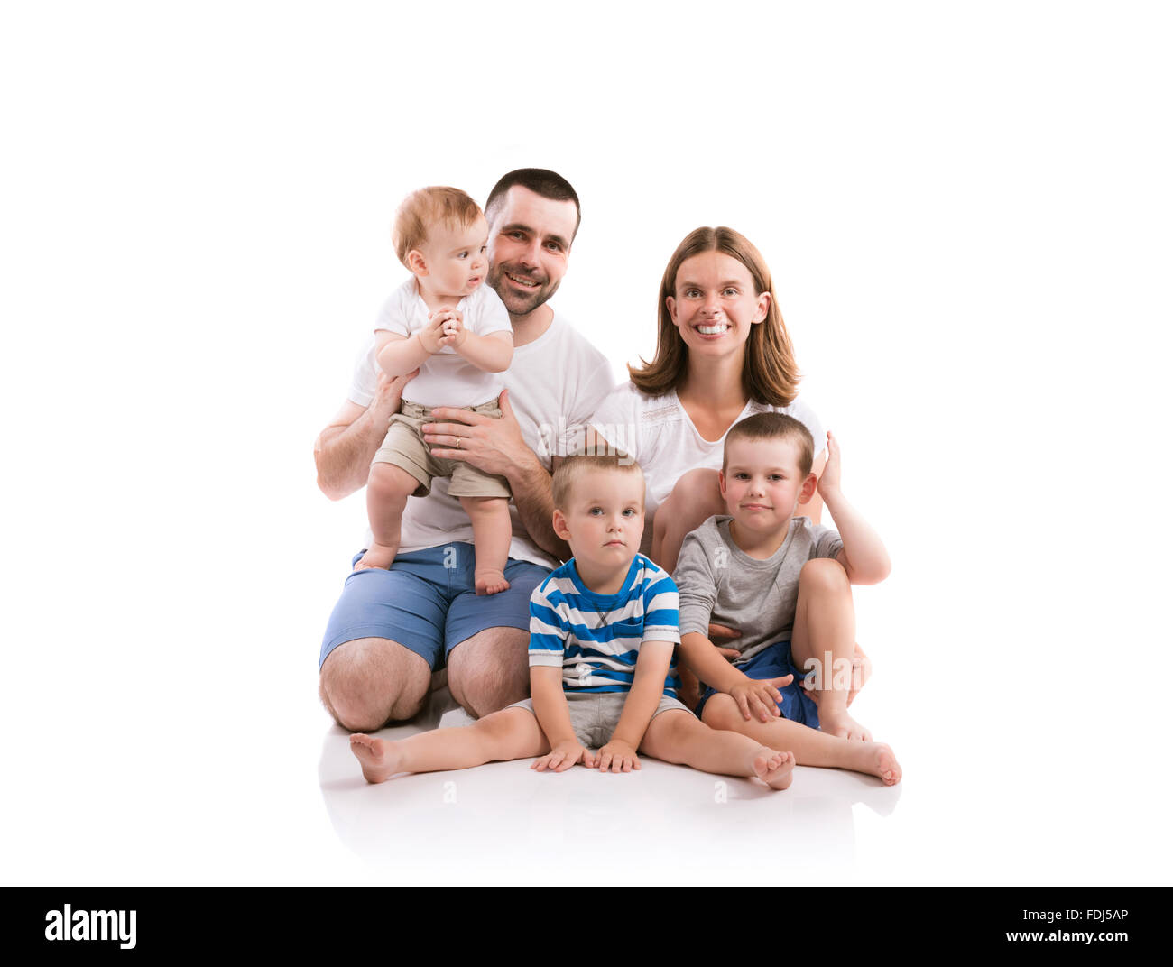 Happy young family Stock Photo - Alamy