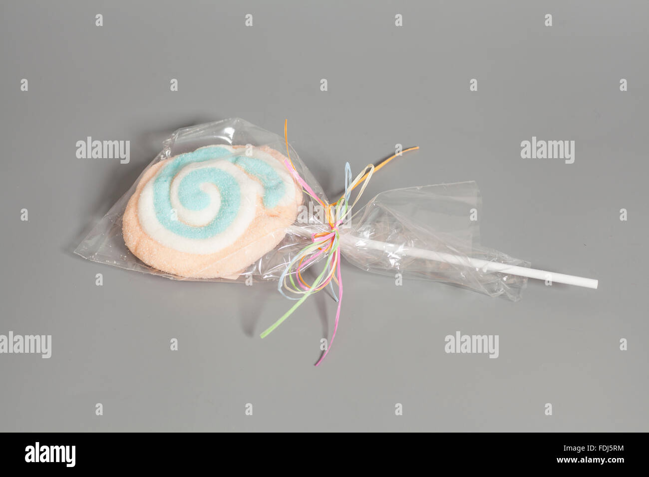 Candy lollipop on gray hi-res stock photography and images - Alamy