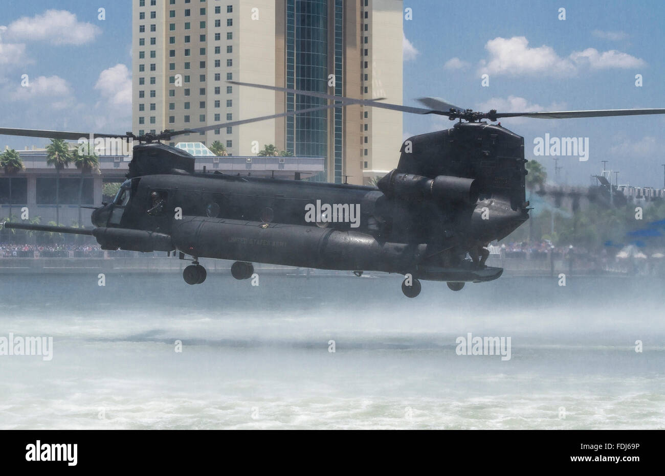 Boeing CH-47 US Army Helicopter operating in front of the Tampa Bay Convention Center during 2012 Special Operation Stock Photo