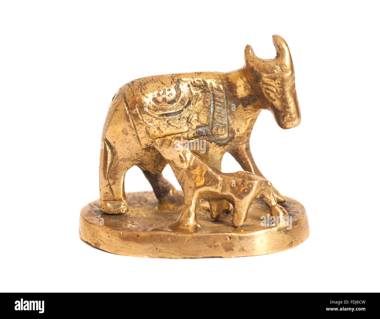 Golden statue cow and calf isolated on white Stock Photo Alamy