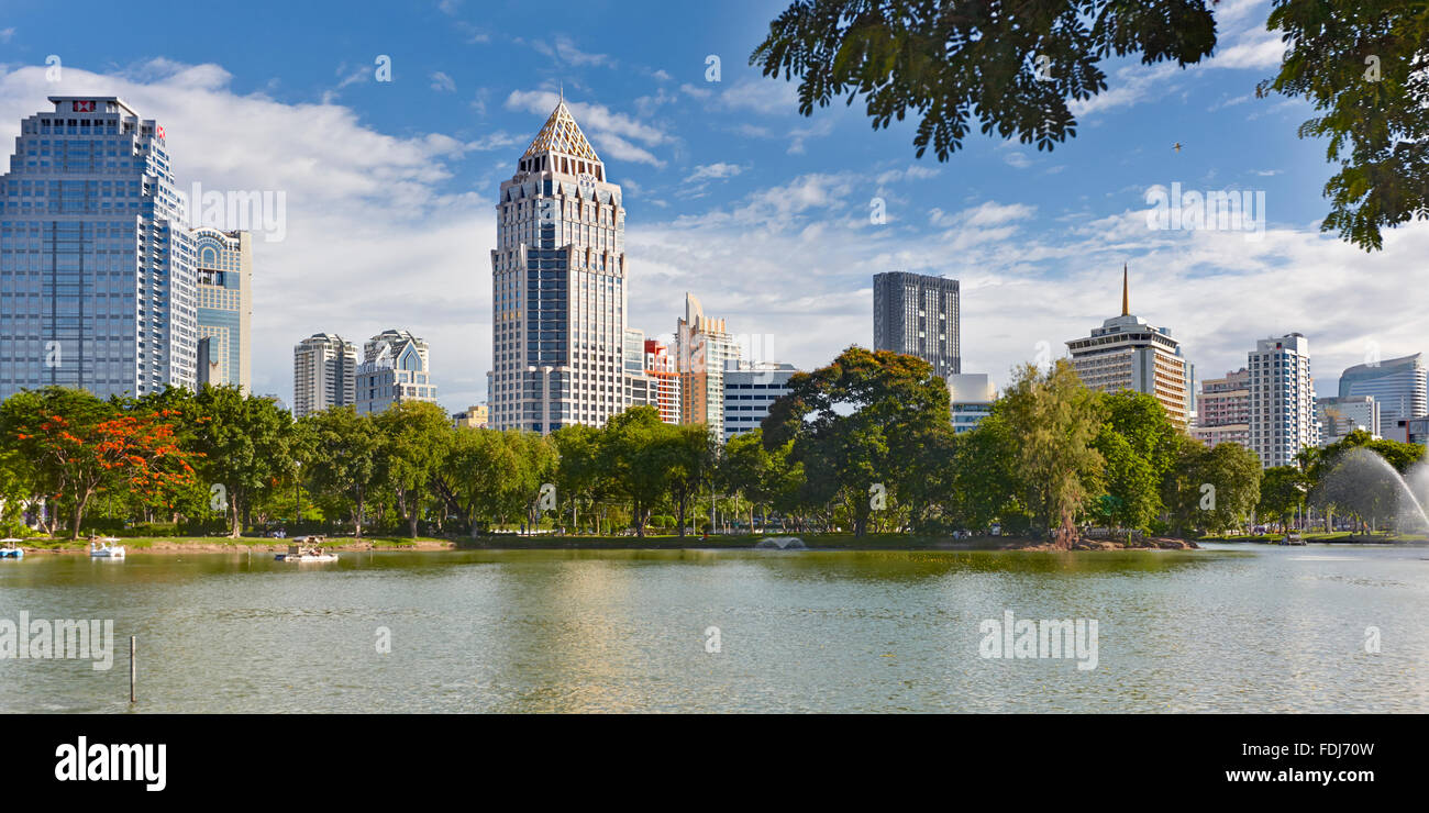 Modern high-rise buildings bordering Lumphini Park. Bangkok, Thailand. Stock Photo