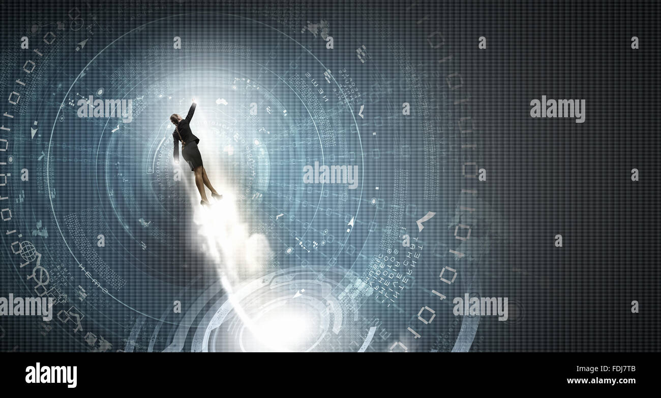 Businesswoman hero in suit flying up into sky Stock Photo - Alamy