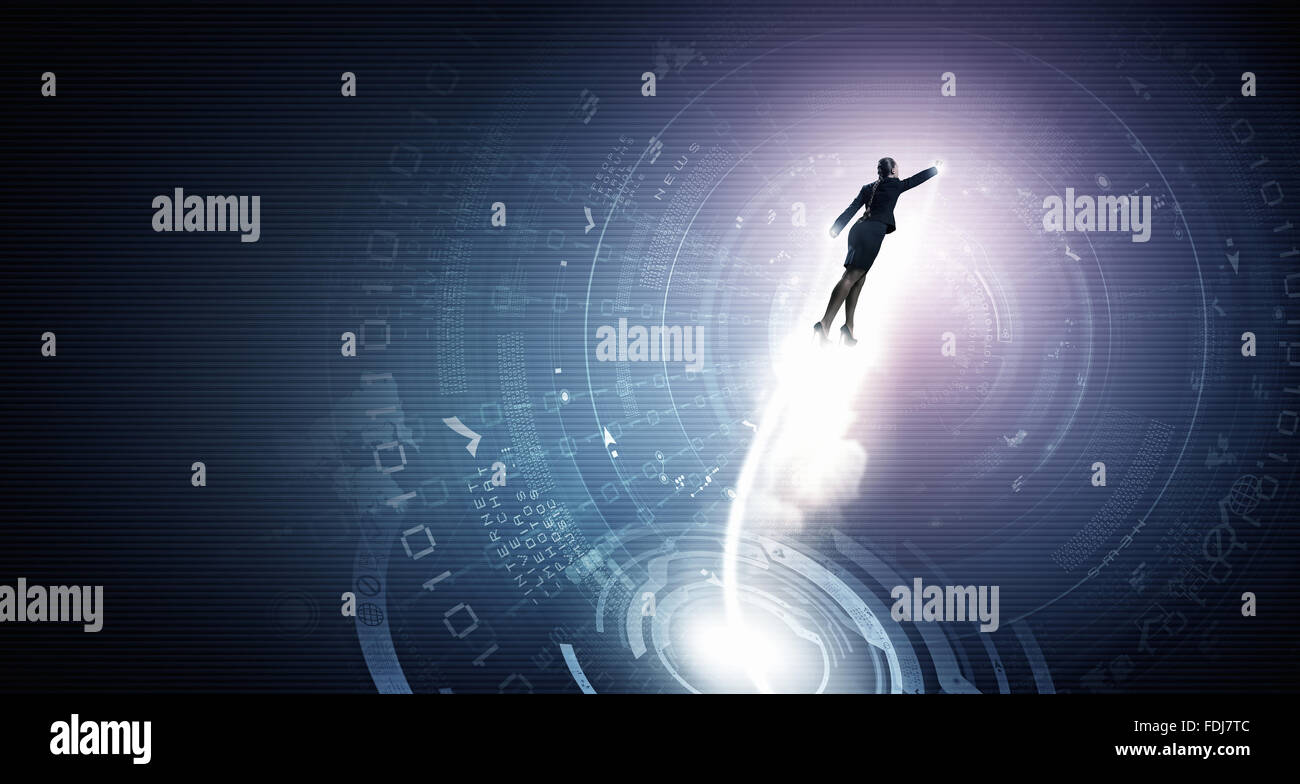 Businesswoman hero in suit flying up into sky Stock Photo - Alamy