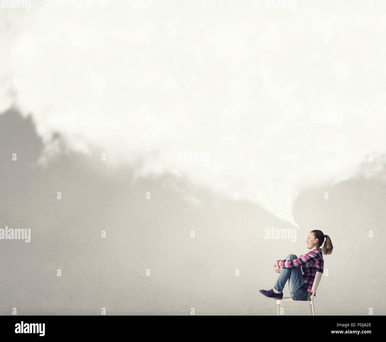 Teenager girl sitting in chair and cloud bubble above her head Stock ...
