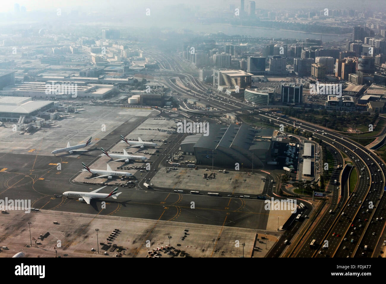 Emirates Airbus A380 parked at Dubai International Airport . Emirates
