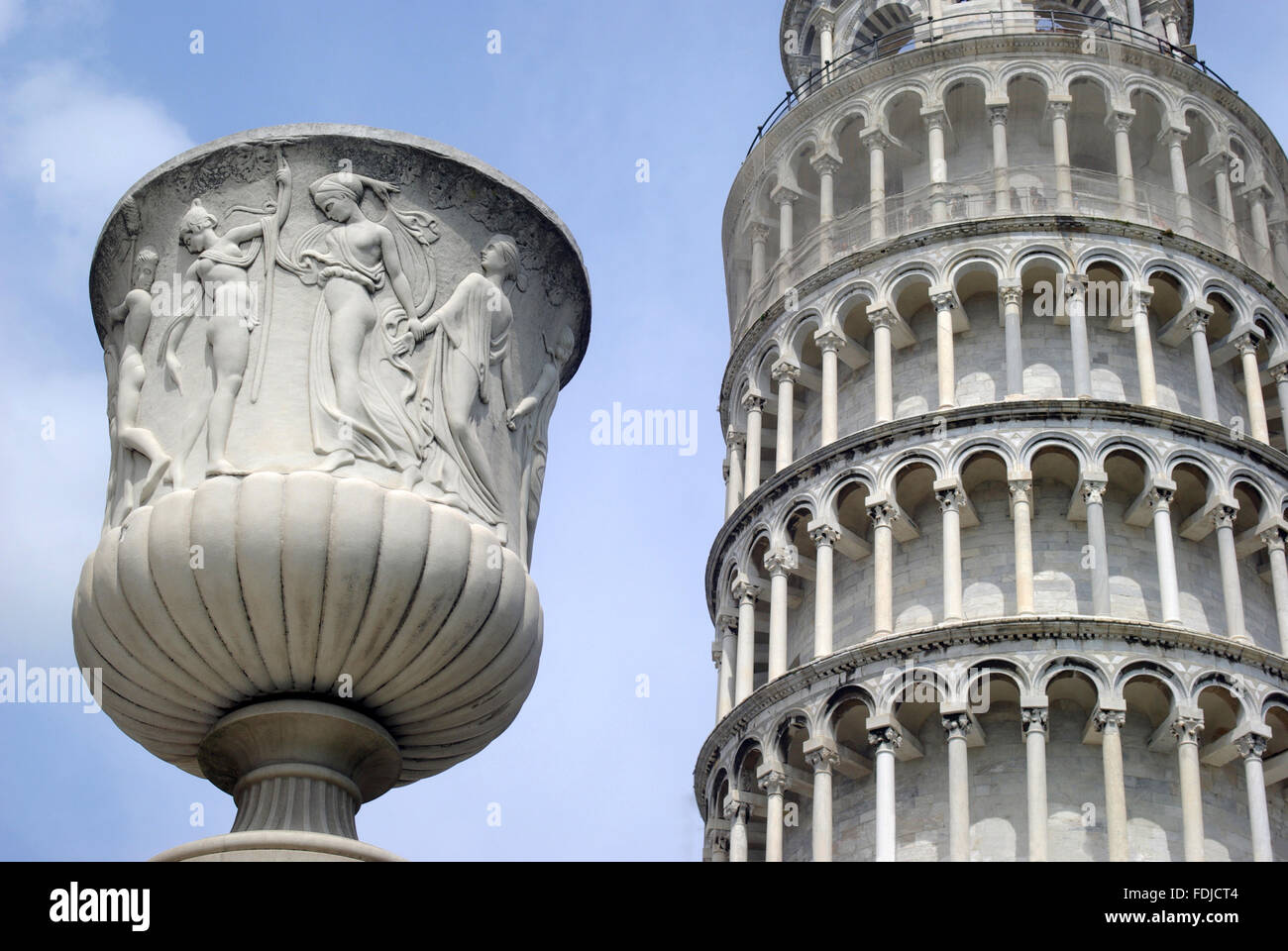 Pisa, Italy. The Leaning Tower with a statue in foreground Stock Photo