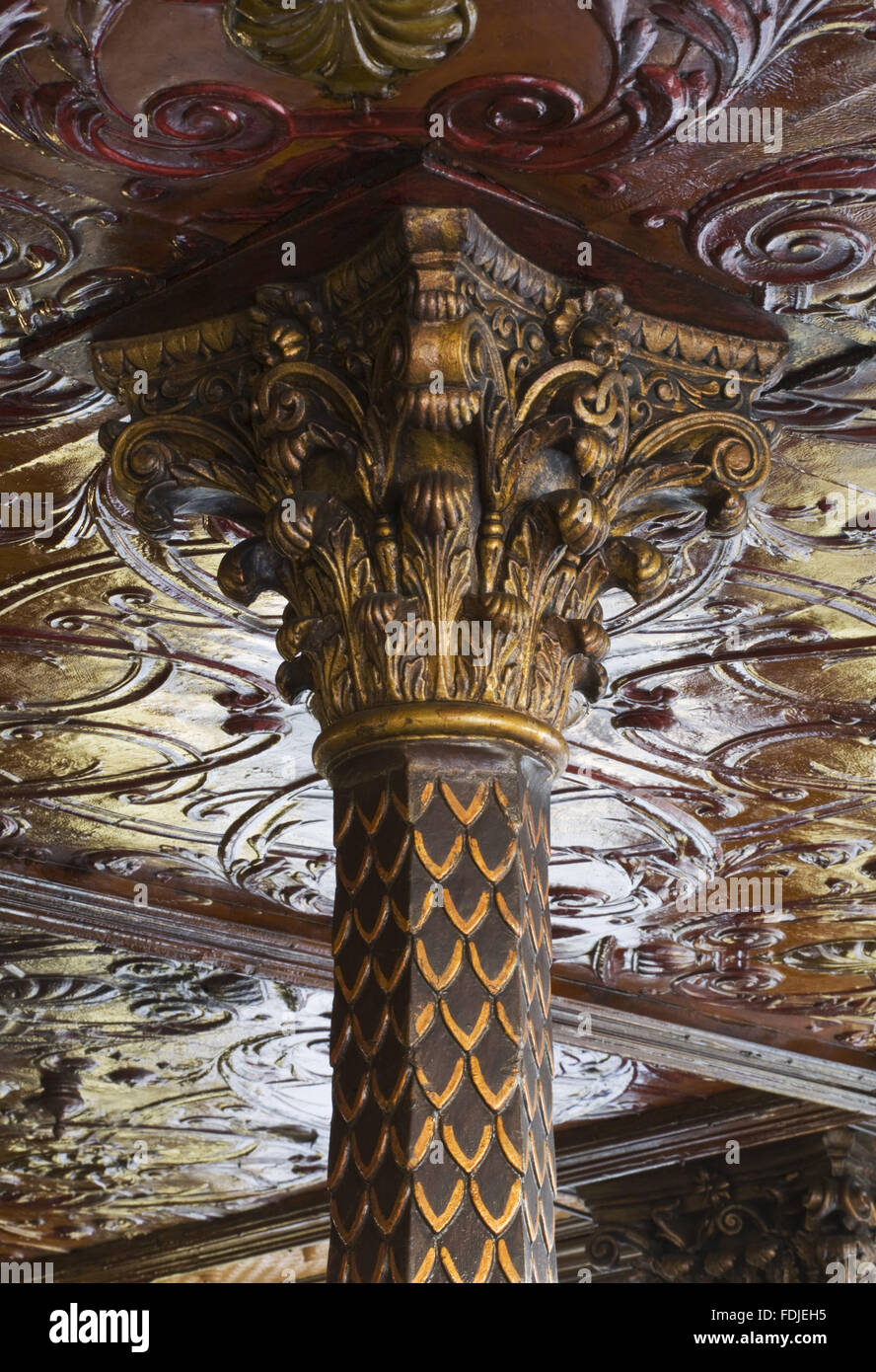 A close view of one of the elaborate capitals on the columns supporting the moulded ceiling of The Crown Bar, Great Victoria Street, Belfast. Formerly known as the Crown Liquor Saloon, the pub building dates from 1826 but the wonderful late Victorian craf Stock Photo