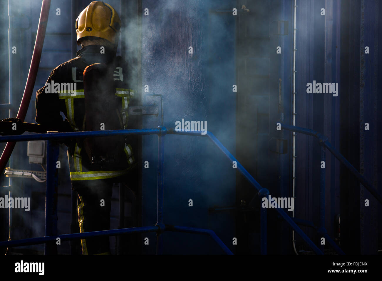 A offshore worker during firefighting training Stock Photo